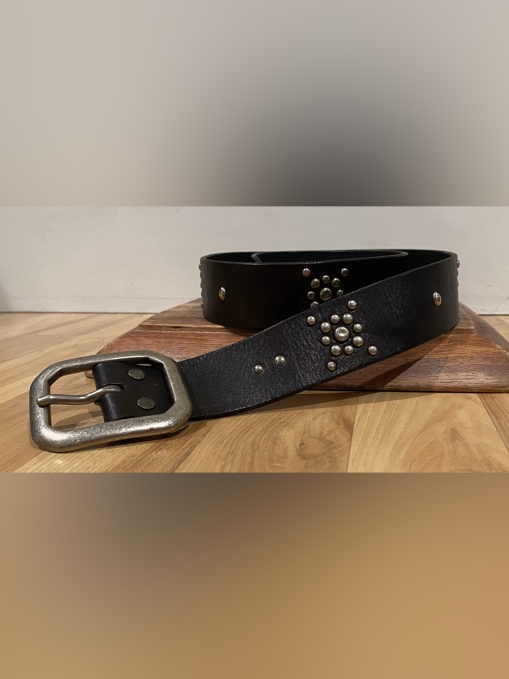 Black Leather Boho style belt with silver accents and buckle. Size M/L.